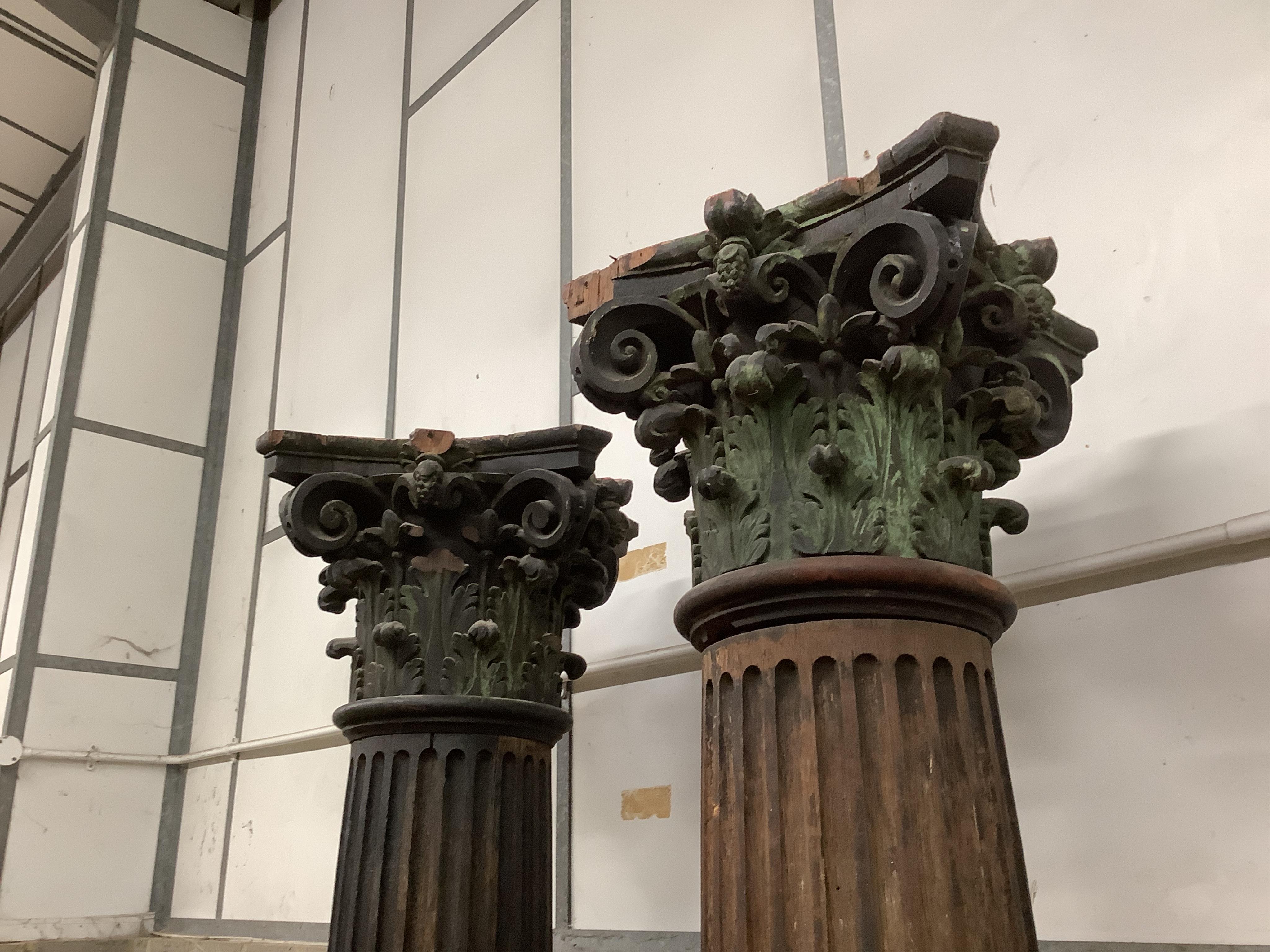 A pair of 17th century oak Corinthian columns, of large size, height 279cm, by repute from St Mary le Bow, designed by Christopher Wren
